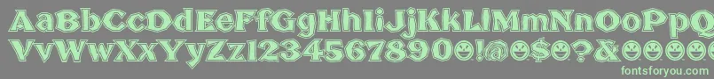 BrokenPosterTour Font – Green Fonts on Gray Background