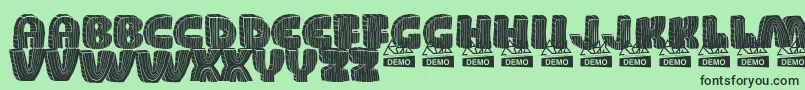 WoodDemo Font – Black Fonts on Green Background