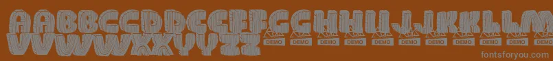 Police WoodDemo – polices grises sur fond brun