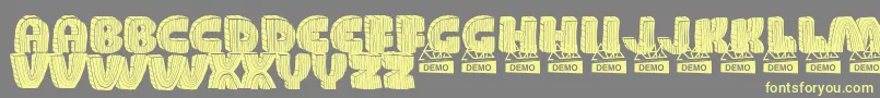 WoodDemo Font – Yellow Fonts on Gray Background