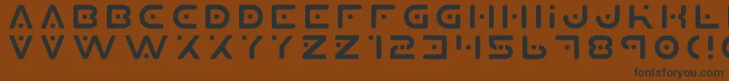 Więcej informacji o czcionce Planet X Czcionka Planet X – czarne czcionki na brązowym tle