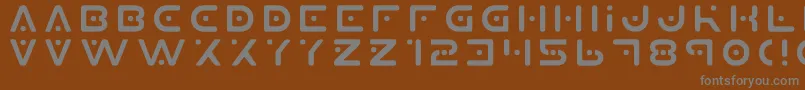 Planet X Font – Gray Fonts on Brown Background