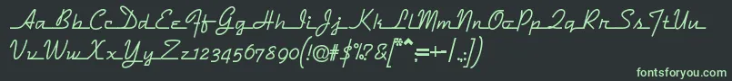 フォントDymaxionscript – 黒い背景に緑の文字