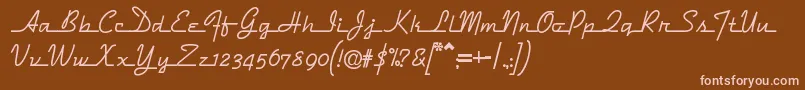 フォントDymaxionscript – 茶色の背景にピンクのフォント