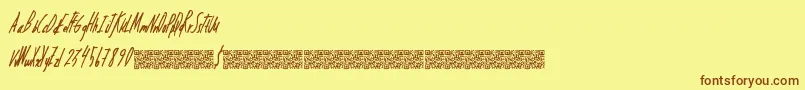 フォントDreamingpandas – 茶色の文字が黄色の背景にあります。