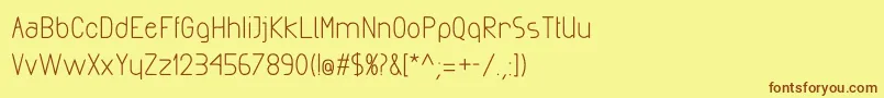 フォントExactaBold – 茶色の文字が黄色の背景にあります。