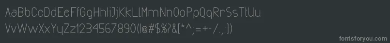 フォントExactaBold – 黒い背景に灰色の文字