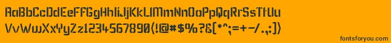 KarismaStencil-Schriftart – Schwarze Schriften auf orangefarbenem Hintergrund