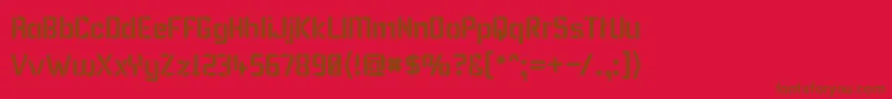 フォントKarismaStencil – 赤い背景に茶色の文字