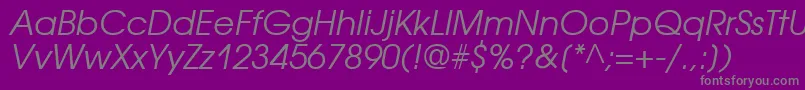 AvantgardecttItalic-Schriftart – Graue Schriften auf violettem Hintergrund