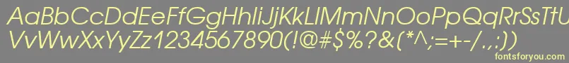 AvantgardecttItalic-fontti – keltaiset fontit harmaalla taustalla