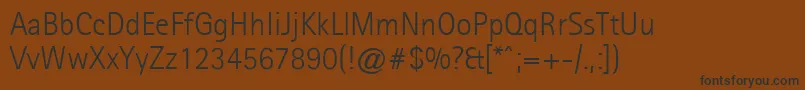 Agfarotissansseriflight-Schriftart – Schwarze Schriften auf braunem Hintergrund
