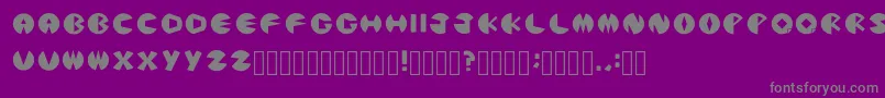Weitere Informationen zur PacmanicRegular-Schriftart PacmanicRegular-Schriftart – Graue Schriften auf violettem Hintergrund