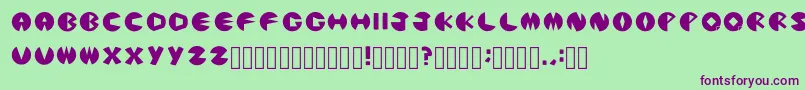 PacmanicRegular Font – Purple Fonts on Green Background