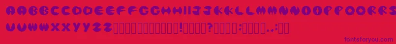PacmanicRegular Font – Purple Fonts on Red Background