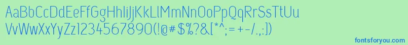 Capsuularegular Font – Blue Fonts on Green Background