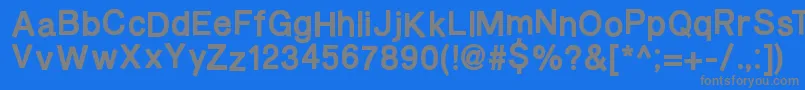 フォントBurveticaThickNc – 青い背景に灰色の文字