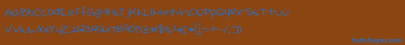 Kristinprint Font – Blue Fonts on Brown Background