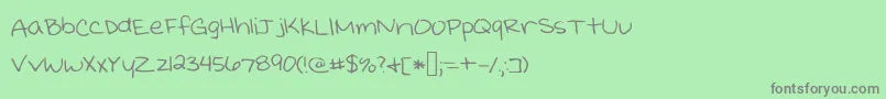 Kristinprint Font – Gray Fonts on Green Background