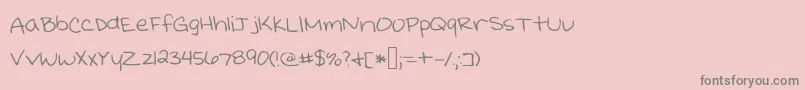 フォントKristinprint – ピンクの背景に灰色の文字