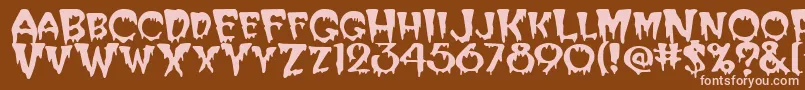 Czcionka Creeper – różowe czcionki na brązowym tle