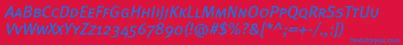 Czcionka MetabookcapscItalic – niebieskie czcionki na czerwonym tle