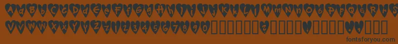Djellibejbi Font – Black Fonts on Brown Background