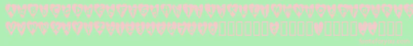 Djellibejbi-fontti – vaaleanpunaiset fontit vihreällä taustalla