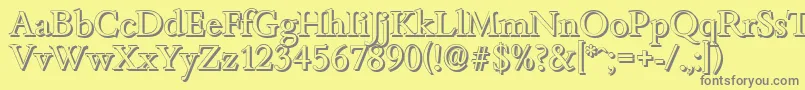 BambergshadowRegular-fontti – harmaat kirjasimet keltaisella taustalla