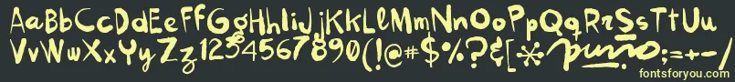 Kokekoko Font – Yellow Fonts on Black Background