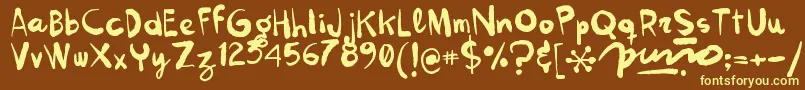 Kokekoko Font – Yellow Fonts on Brown Background