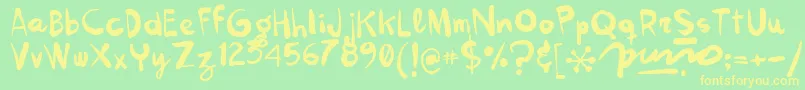 Kokekoko Font – Yellow Fonts on Green Background