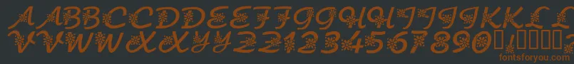 KrFloralScript-Schriftart – Braune Schriften auf schwarzem Hintergrund