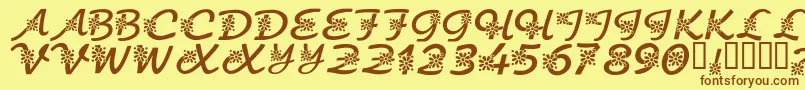 フォントKrFloralScript – 茶色の文字が黄色の背景にあります。