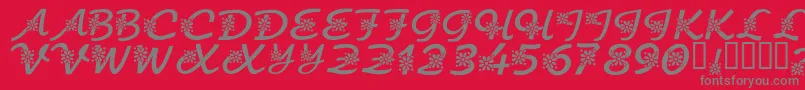 Fonte KrFloralScript – fontes cinzas em um fundo vermelho