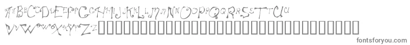 Spitcurl-fontti – harmaat kirjasimet valkoisella taustalla