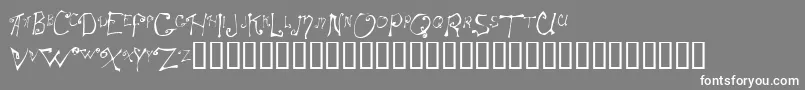 フォントSpitcurl – 灰色の背景に白い文字