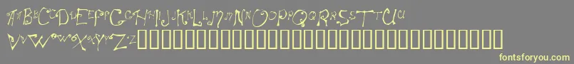 Spitcurl Font – Yellow Fonts on Gray Background
