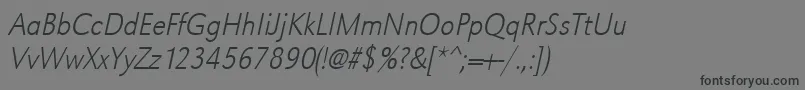 UrwgrotesktextligextnarOblique-Schriftart – Schwarze Schriften auf grauem Hintergrund