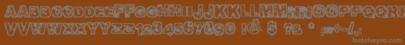 Oomph-fontti – harmaat kirjasimet ruskealla taustalla