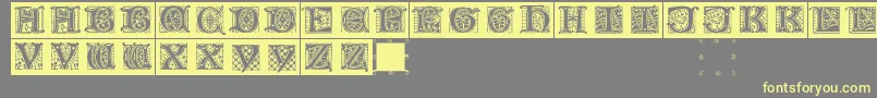 Lombardicaps Font – Yellow Fonts on Gray Background