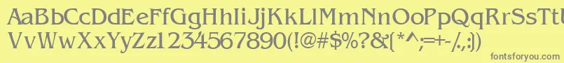 フォントWandssk – 黄色の背景に灰色の文字