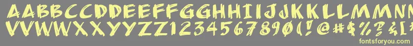 Шрифт Anudrg – жёлтые шрифты на сером фоне