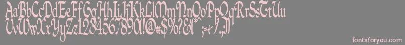 フォントQuillpc – 灰色の背景にピンクのフォント