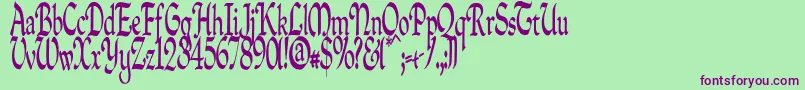Quillpc-fontti – violetit fontit vihreällä taustalla