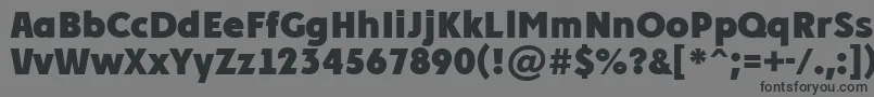 PlakatcmplExtrabold-Schriftart – Schwarze Schriften auf grauem Hintergrund