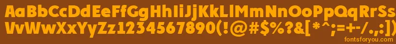 Czcionka PlakatcmplExtrabold – pomarańczowe czcionki na brązowym tle
