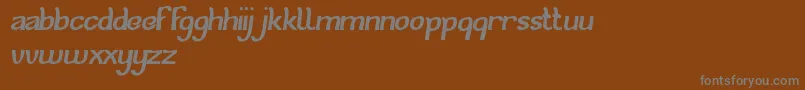 CatEyes Font – Gray Fonts on Brown Background