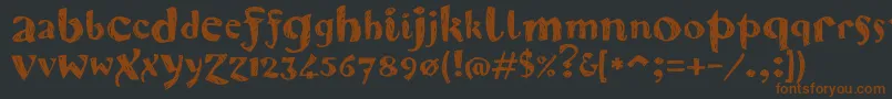 Karvwood Font – Brown Fonts on Black Background