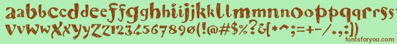 Karvwood Font – Brown Fonts on Green Background